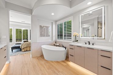 Modern bath/vanity design with integrated custom cabinets in Khaki Linen by Salt for Indio home.