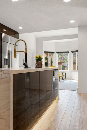 Modern kitchen design with integrated custom cabinets clad in Olmo Gloss, the Luxe Collection, Alvic