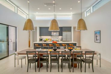 Modern kitchen design with integrated custom cabinets in Super Matte Graphite by Mirlux.