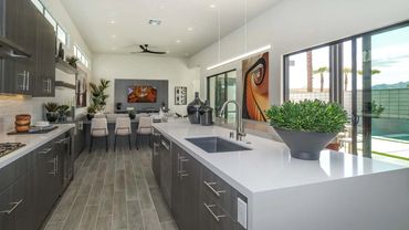 Woodgrain Oyster Pine by American Laminates on custom cabinets for kitchen design in Palm Springs.