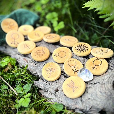 Set of planetary Runes presented on bark.