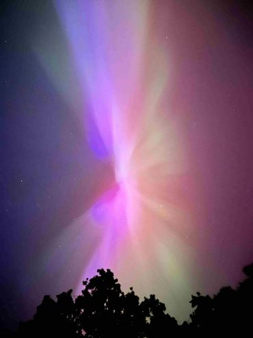 The aurora light patterns above our house in Ashbourne.