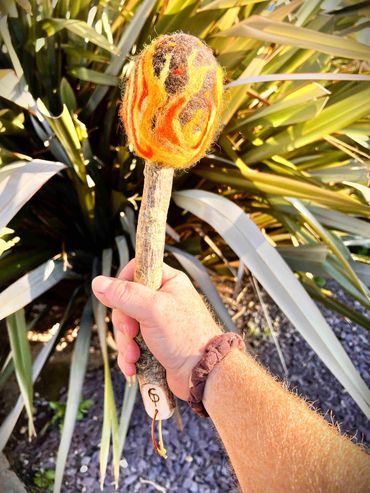 Full size image of the first camp fire beater with an oversizeed width oak handle.