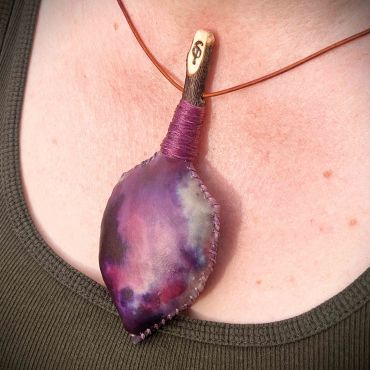 Mottled purple leaf shaped rattle