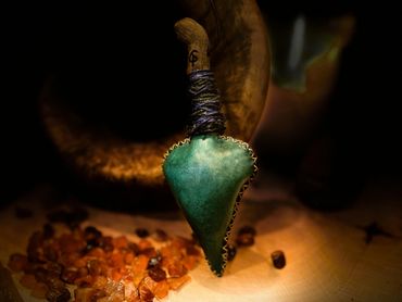 Green snakeshead rattle with blie wrap.