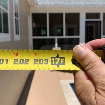 tape measure and house