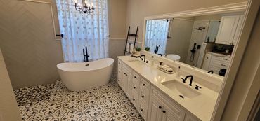 Elegant bathroom with freestanding tub and double sink vanity