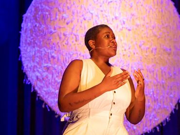 A intimate moment during M'ap Boulé on stage Red Earth Arts Precinct Karratha Pilbara during REAF Fe