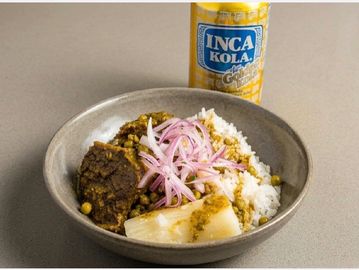 Braised cilantro & based beef stew, simmered in Peruvian spices. Served with white rice, peas, yucc