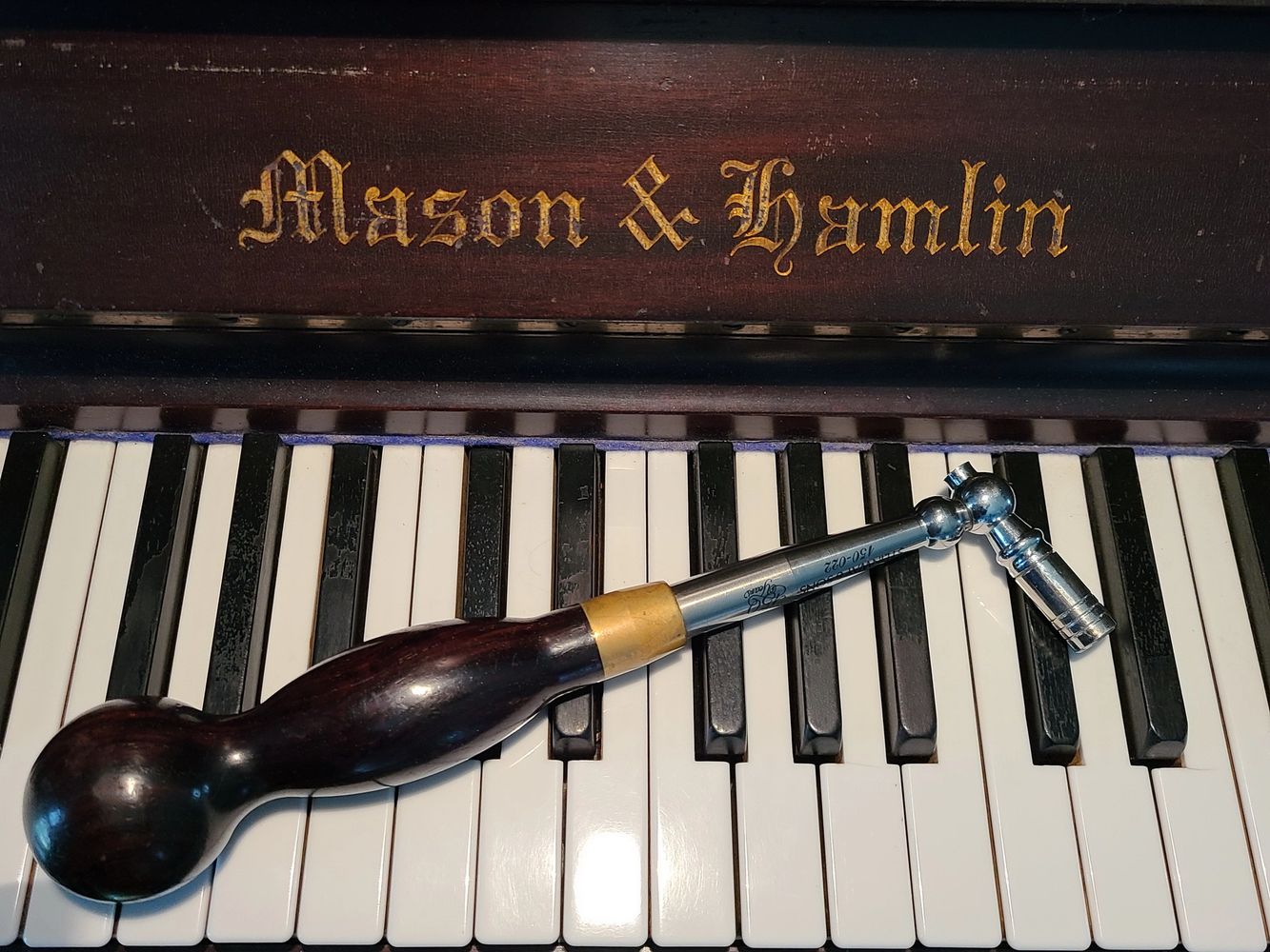 Piano and tuning hammer