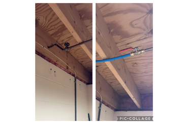 A couple of pipes hanging from the ceiling.