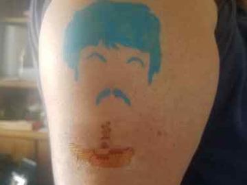 This is an old woman. I Beatles silhouette is he alcohol base paint, and the submarine is a temporar