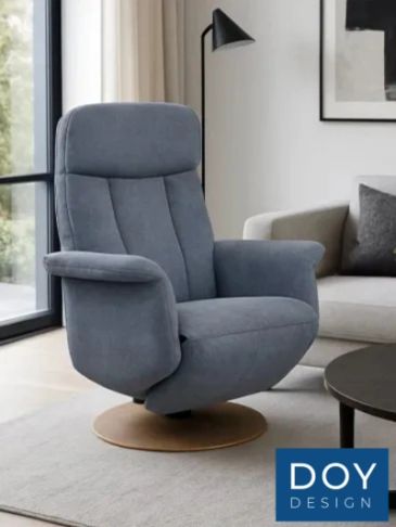 Modern blue recliner chair in a stylish living room.