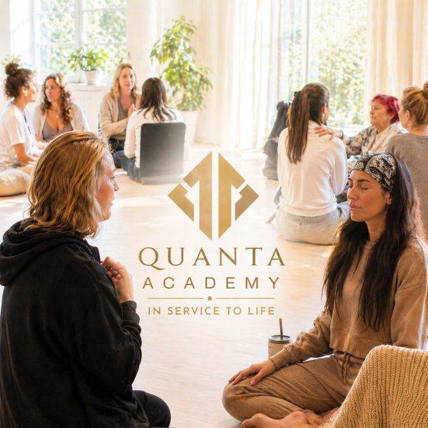 People meditating and engaging in deep conversation at Quanta Academy.