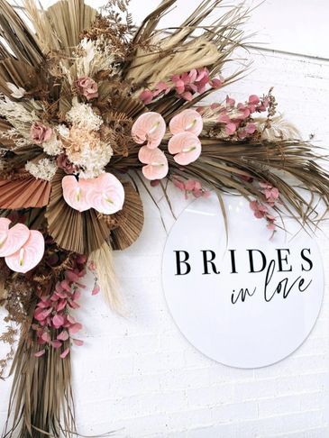 Business signage with dried  florals
