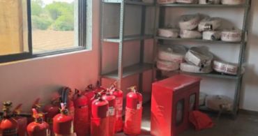 Fire safety equipment stored in a room.