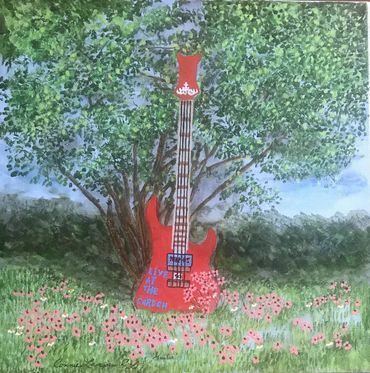 Guitar is in the Live Garden. 
It was designed by Ron Olson.