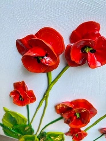 A painting of red poppies with green leaves and stems on a white canvas background.