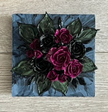 A dark, square artwork featuring deep purple and black roses surrounded by green leaves