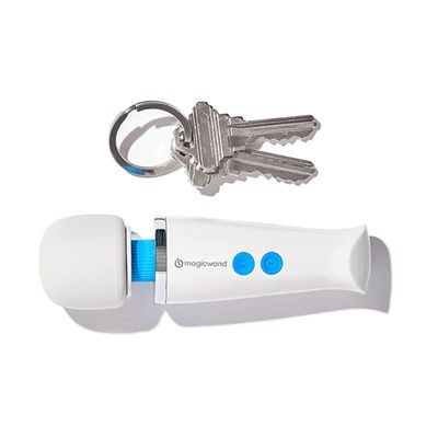 Compact Magic Wand massager next to a keychain with two keys.