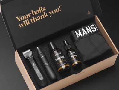 Manscaped grooming kit with trimmers, deodorant, and underwear, inside a branded box.