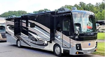 Mobile RV company working on customers RVs in camp grounds.