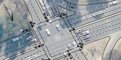 Aerial view of Albertina Sisulu Road and Queen Street intersection with traffic markings.