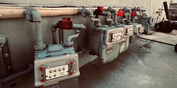 view of earthquake valves installed on apartment building gas meters