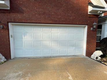 a white sectional doble wide garage door
