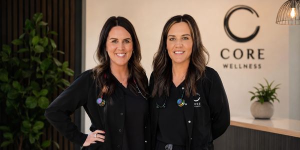 Two female healthcare professionals at Core Wellness.