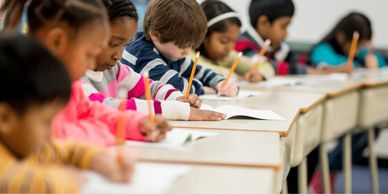 Students taking assessments to determine their true grade level.