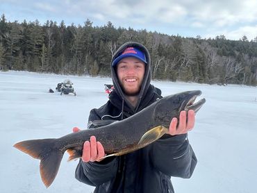 ice fishing for big lake trout in maine