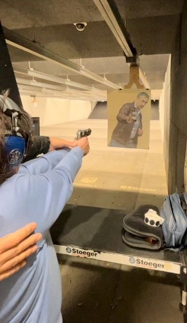 90 year old Student shooting a .45 caliber pistol, handle with care.