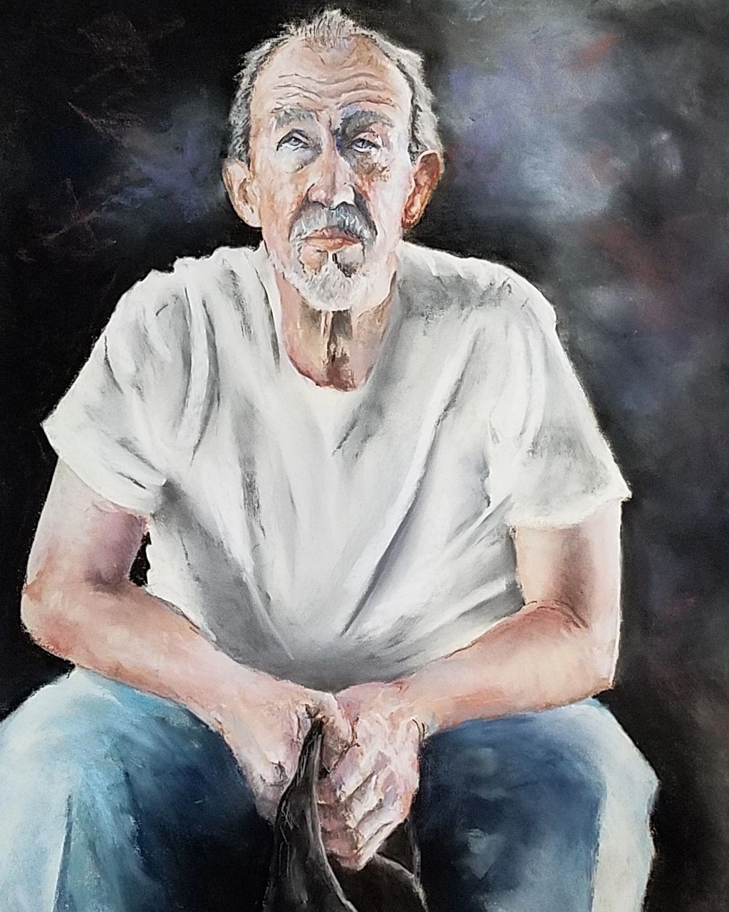 MAN WITH HAT IN HAND