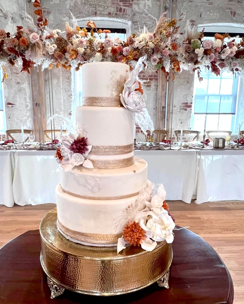 five tier wedding cake designed by Unbirthday Cakes & Pastries. bronze, creme, and burgundy at