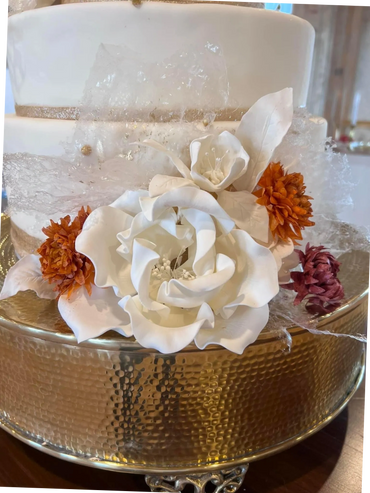 Edible flowers ivory, purple, and orange.