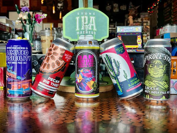 Featured beers including an IPA, Stout, Ale, and Hazy IPA