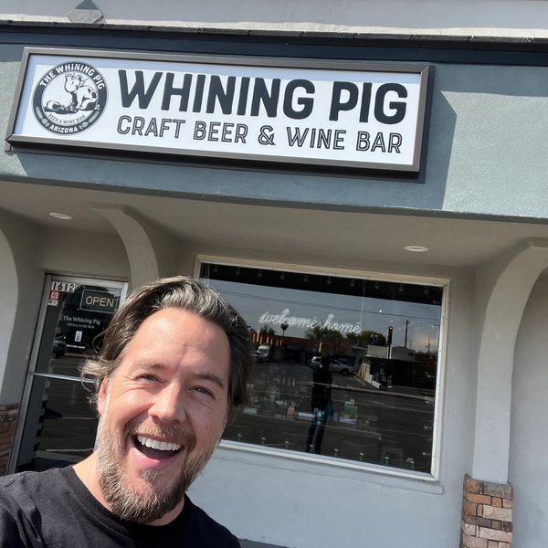 Front sign of The Whining Pig Phoenix Beer and Wine Bar on 16th Street and Bethany Home Rd