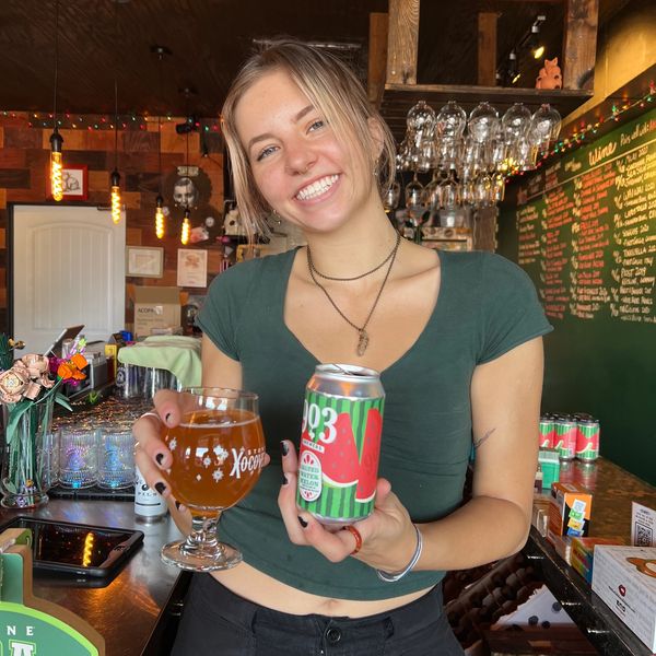 Bartender Stephanie (DJ Casti) showing a gose beer