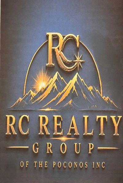 Elegant gold logo of RC Realty Group with mountain and star design.
