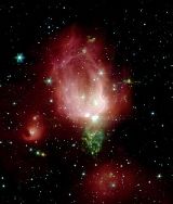 Rosebud-shaped (and rose-colored) nebulosity known as NGC 7129