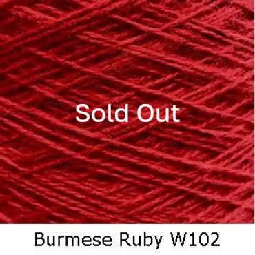 Close-up of Burmese Ruby W102 red yarn labeled 'Sold Out'.