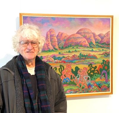 David R Hill in front of his painting, Kata Juta-Mystique, 2022-24