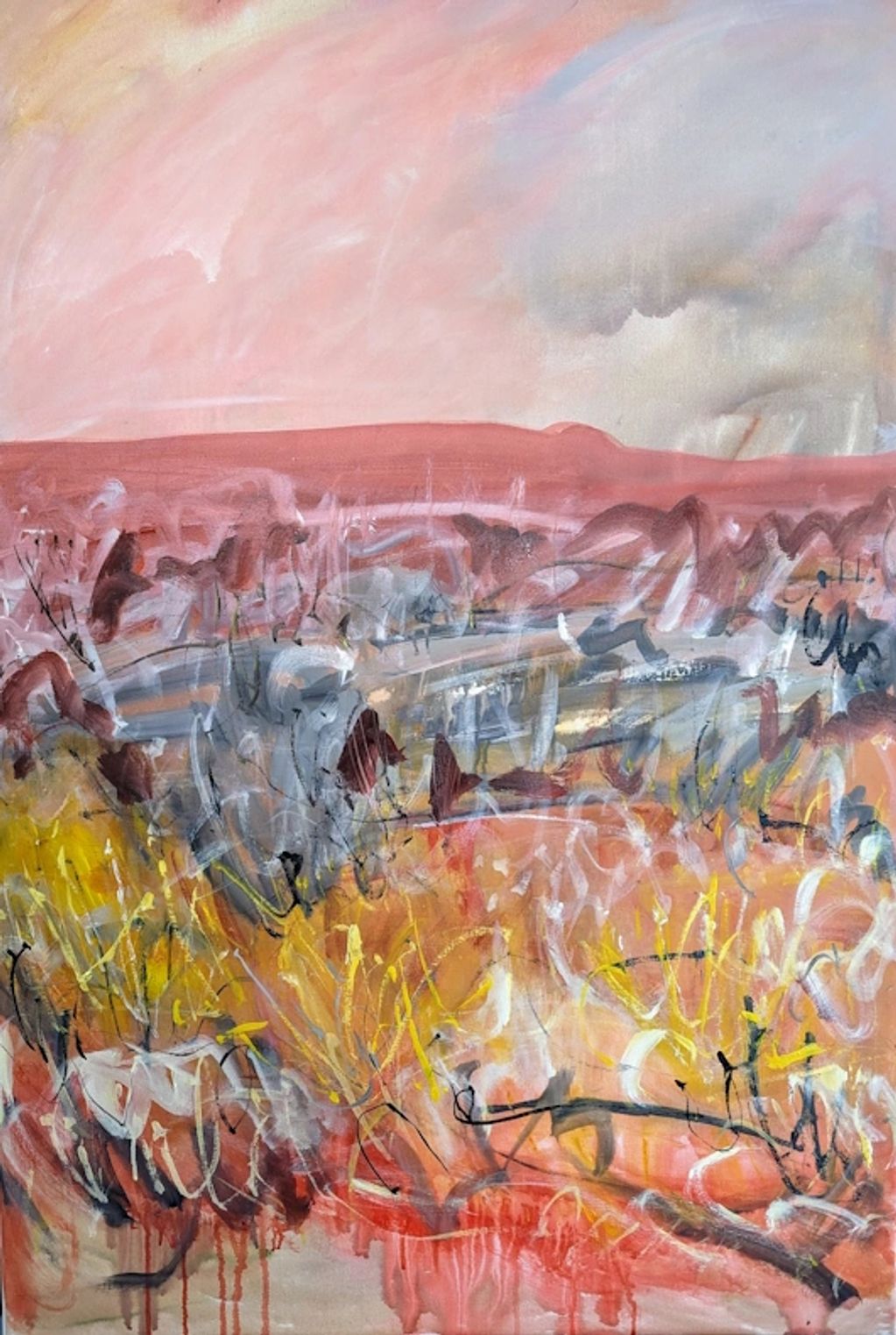 A semi abstract landscape painting of Larapinta in warm colours and energetic gestural marks