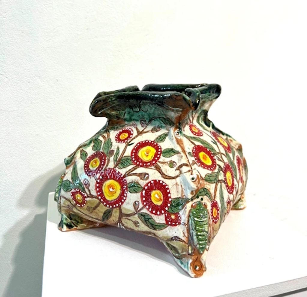 a highly decorated earthenware & slip ceramic square bowl, majolica style with a greengrocer cicada