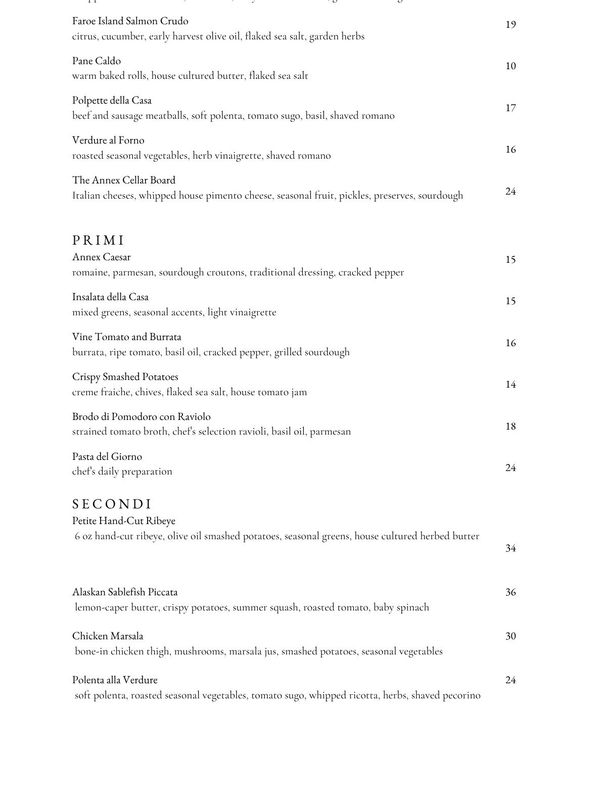 Menu featuring seafood, salads, and main courses with Italian influences.