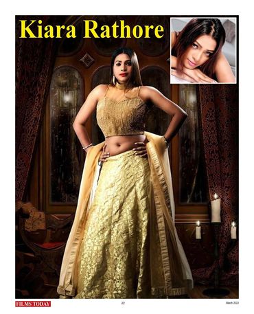 Kiara Rathore in a traditional golden outfit posing confidently indoors.