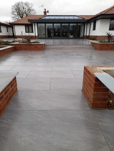Porcelain Patio
Drury Landscapes
Jason Drury
Patios
Modern Sleek Patios
Grey Patio