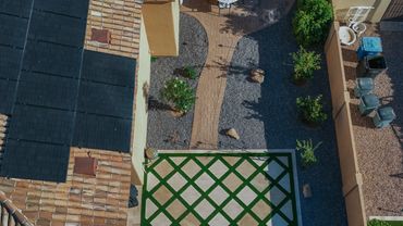 Backyard oasis in Chandler with Southwest-inspired design and grid travertine lattice