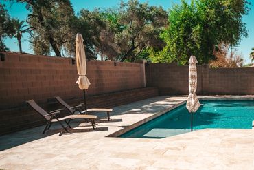 Park Promenade backyard remodel with new pool paver decking in Gilbert